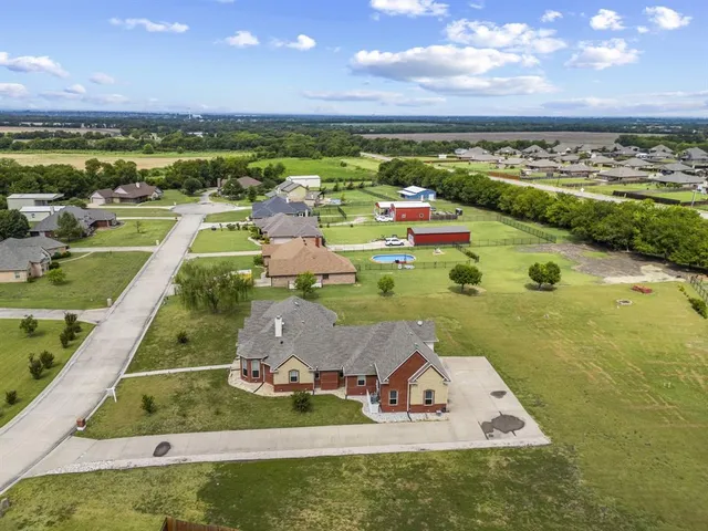 a view of balcony with wooden floor and fence