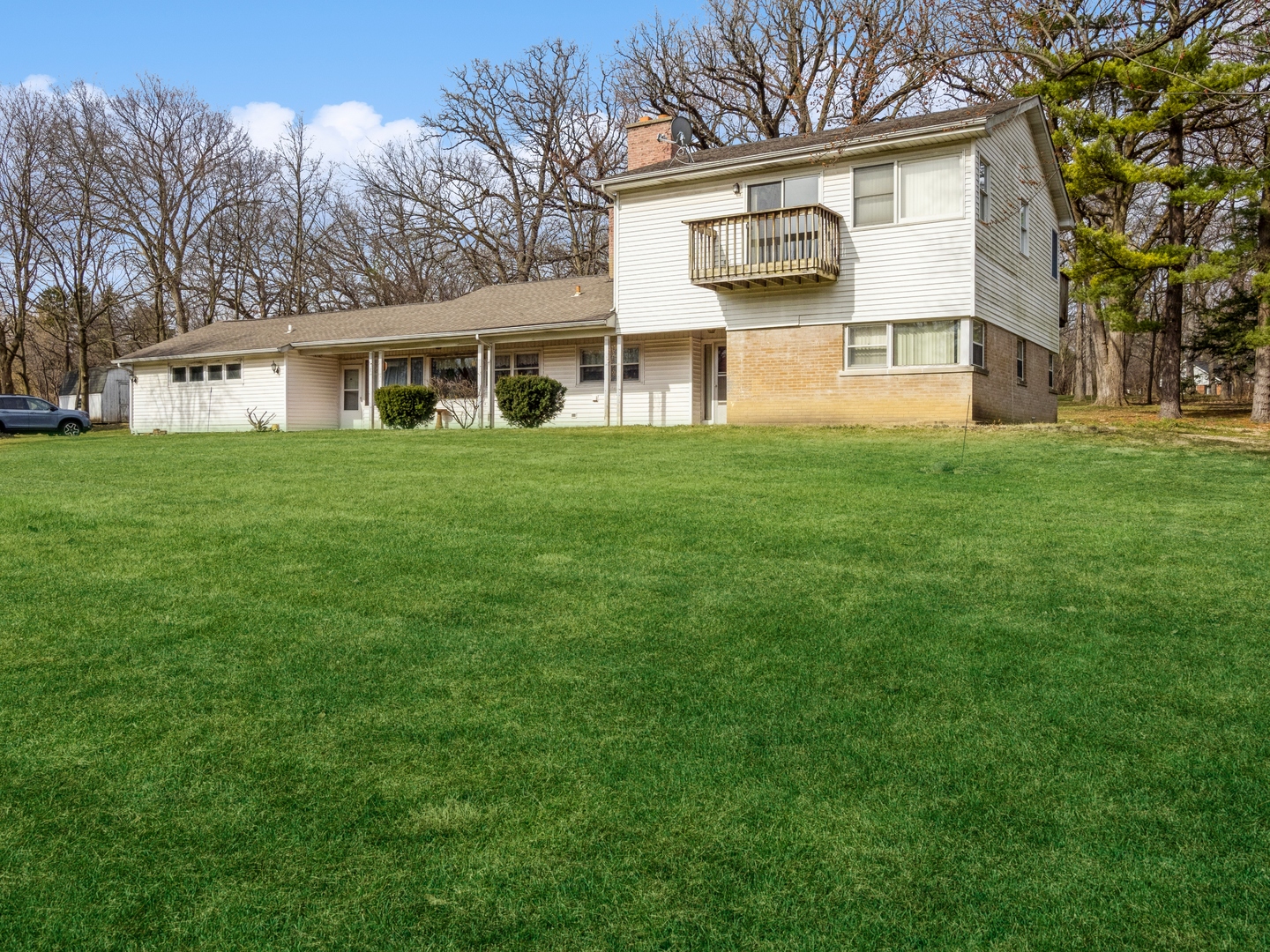 1762 West Palatine Road Palatine, IL 60067 - Photo 1 of 13 a view of a yard in front of a house with large trees