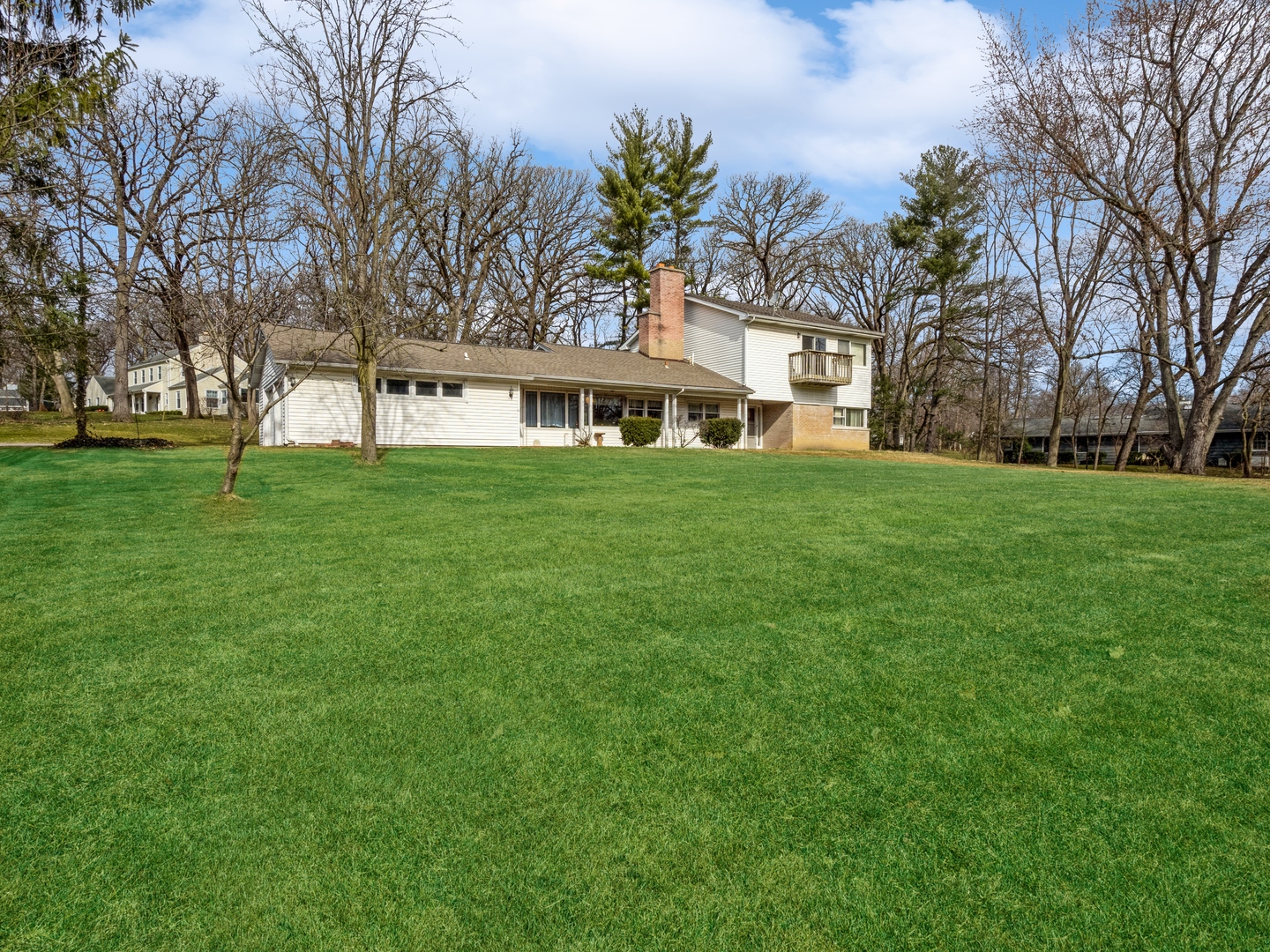 1762 West Palatine Road Palatine, IL 60067 - Photo 2 of 13 a front view of house with yard and trees
