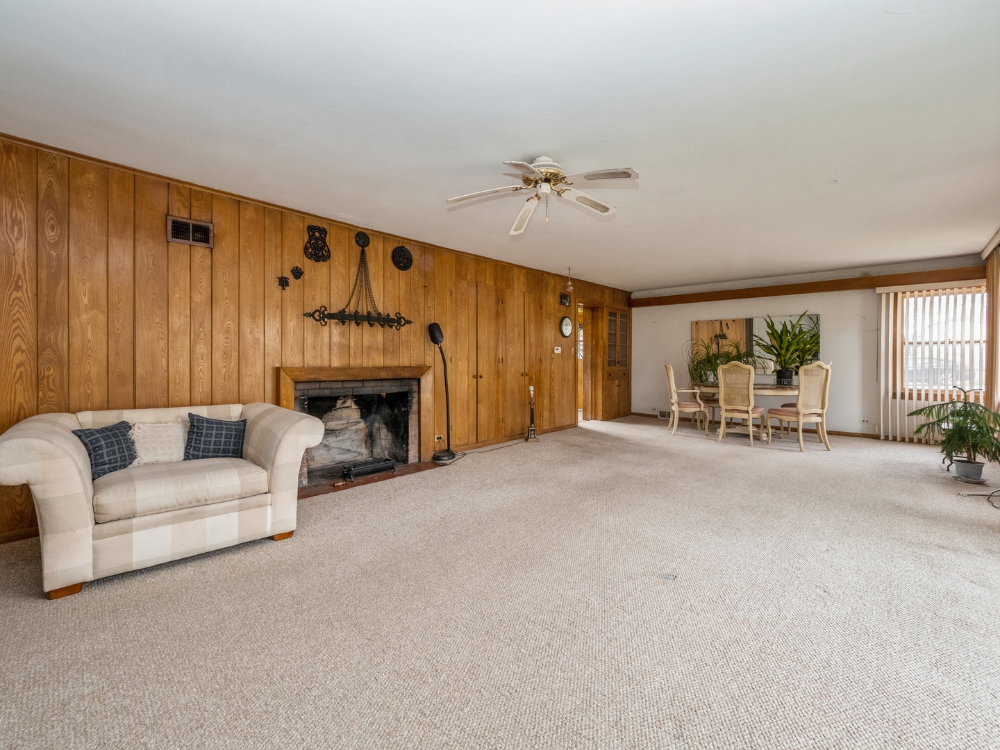 1762 West Palatine Road Palatine, IL 60067 - Photo 3 of 13 a living room with furniture and a fireplace