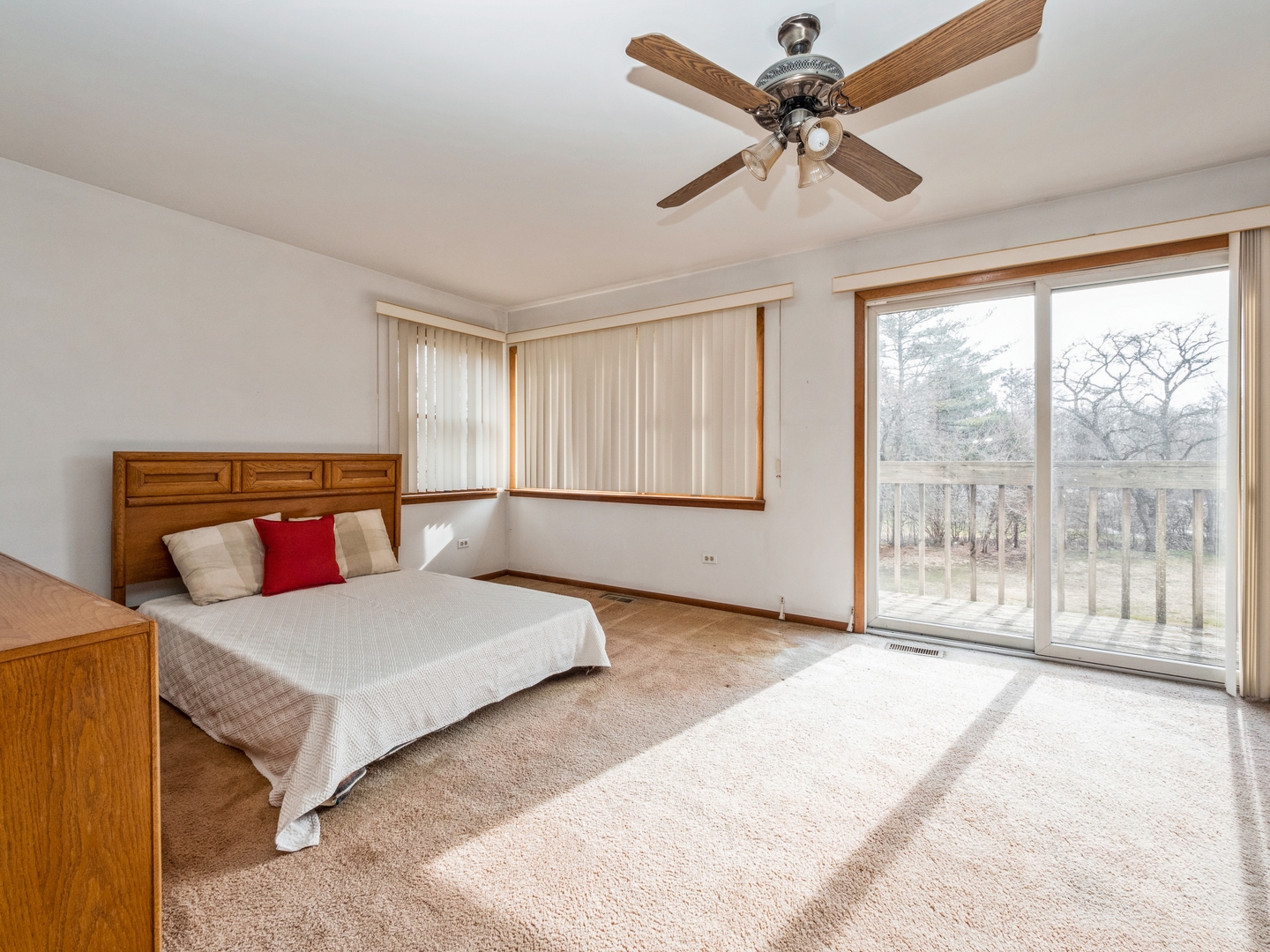 1762 West Palatine Road Palatine, IL 60067 - Photo 8 of 13 a bedroom with a large bed and a large window
