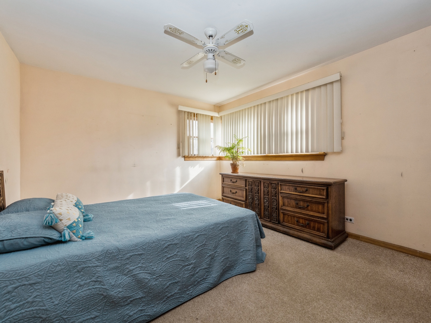 1762 West Palatine Road Palatine, IL 60067 - Photo 9 of 13 a bedroom with a bed and window