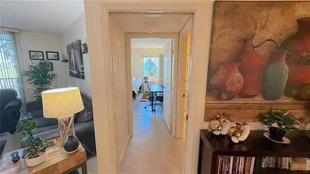 a view of a livingroom with furniture and wooden floor