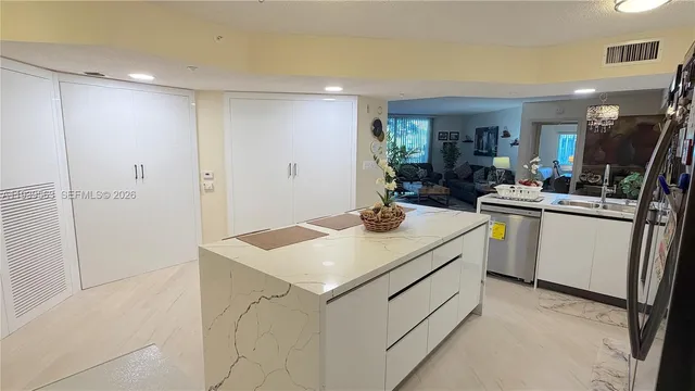 a view of counter top space and sink