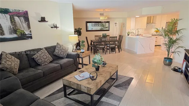 a living room with furniture and a table