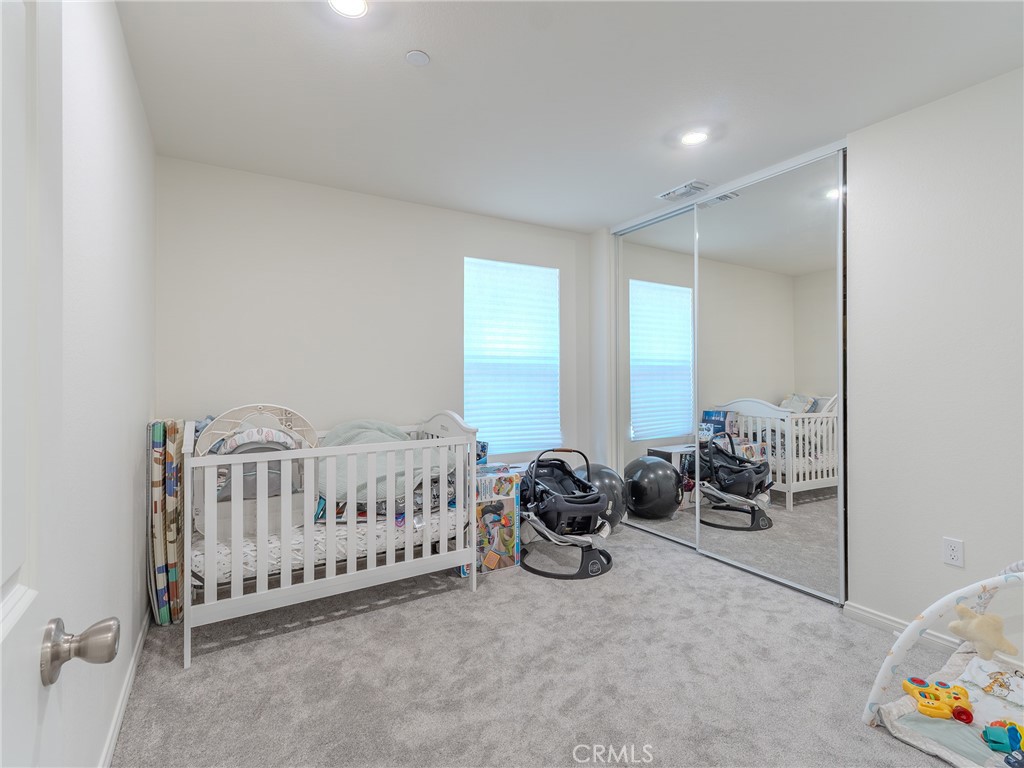 25602 Pne Rdg Road Homeland, CA 92548 - Photo 16 of 35 a view of a room with furniture and toys