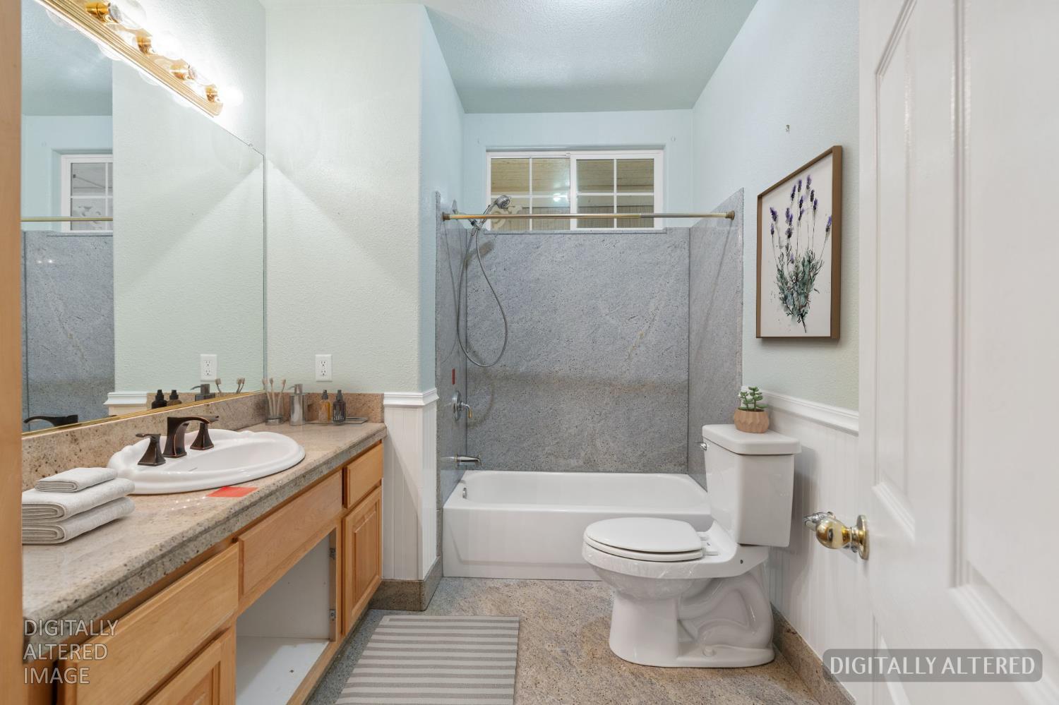 4410 Rossler Road Placerville, CA 95667 - Photo 29 of 35 a bathroom with a sink a toilet and shower