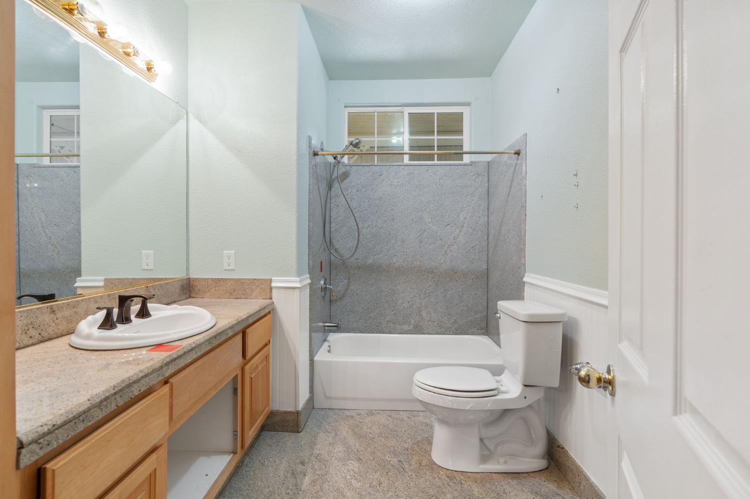 4410 Rossler Road Placerville, CA 95667 - Photo 30 of 35 a bathroom with a sink toilet and shower