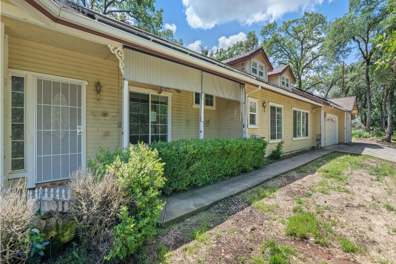 4410 Rossler Road Placerville, CA 95667 - Photo 3 of 35 front view of a house with a yard