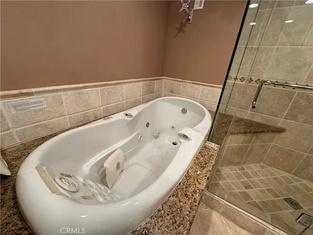 a bath tub sitting in a bathroom