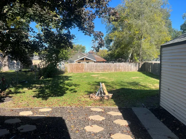 a view of swimming pool from a yard