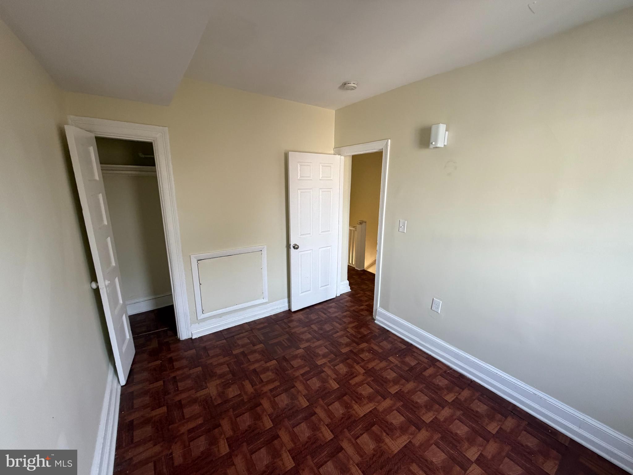 130 16th Street Northeast Washington, DC 20002 - Photo 11 of 24 a bedroom with a bed and a mirror