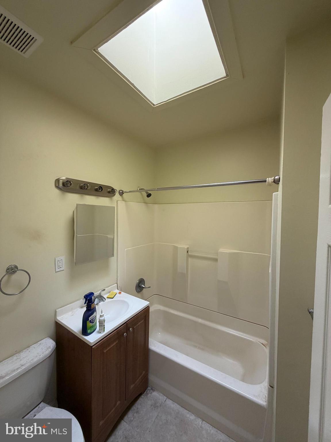 130 16th Street Northeast Washington, DC 20002 - Photo 13 of 24 a bathroom with a tub a toilet and a sink
