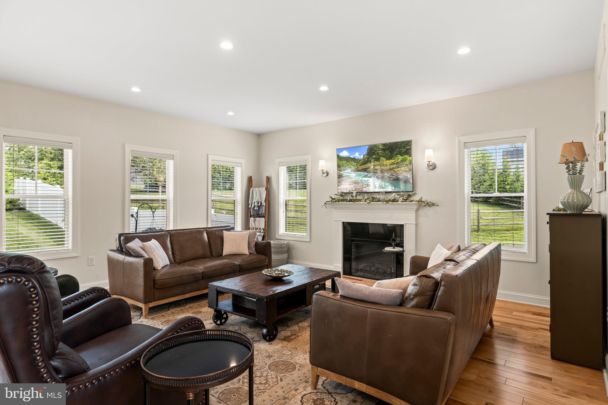 1413 Cortez Road Blue Bell, PA 19422 - Photo 11 of 66 a living room with furniture and a fireplace