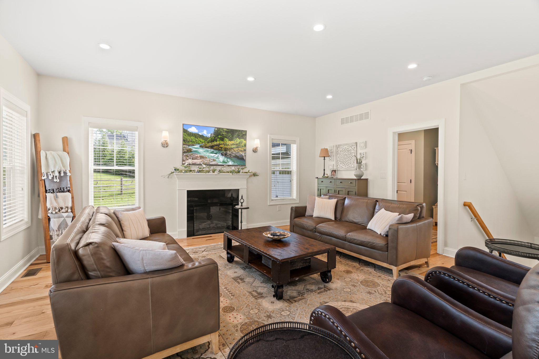 1413 Cortez Road Blue Bell, PA 19422 - Photo 13 of 66 a living room with furniture and a fireplace