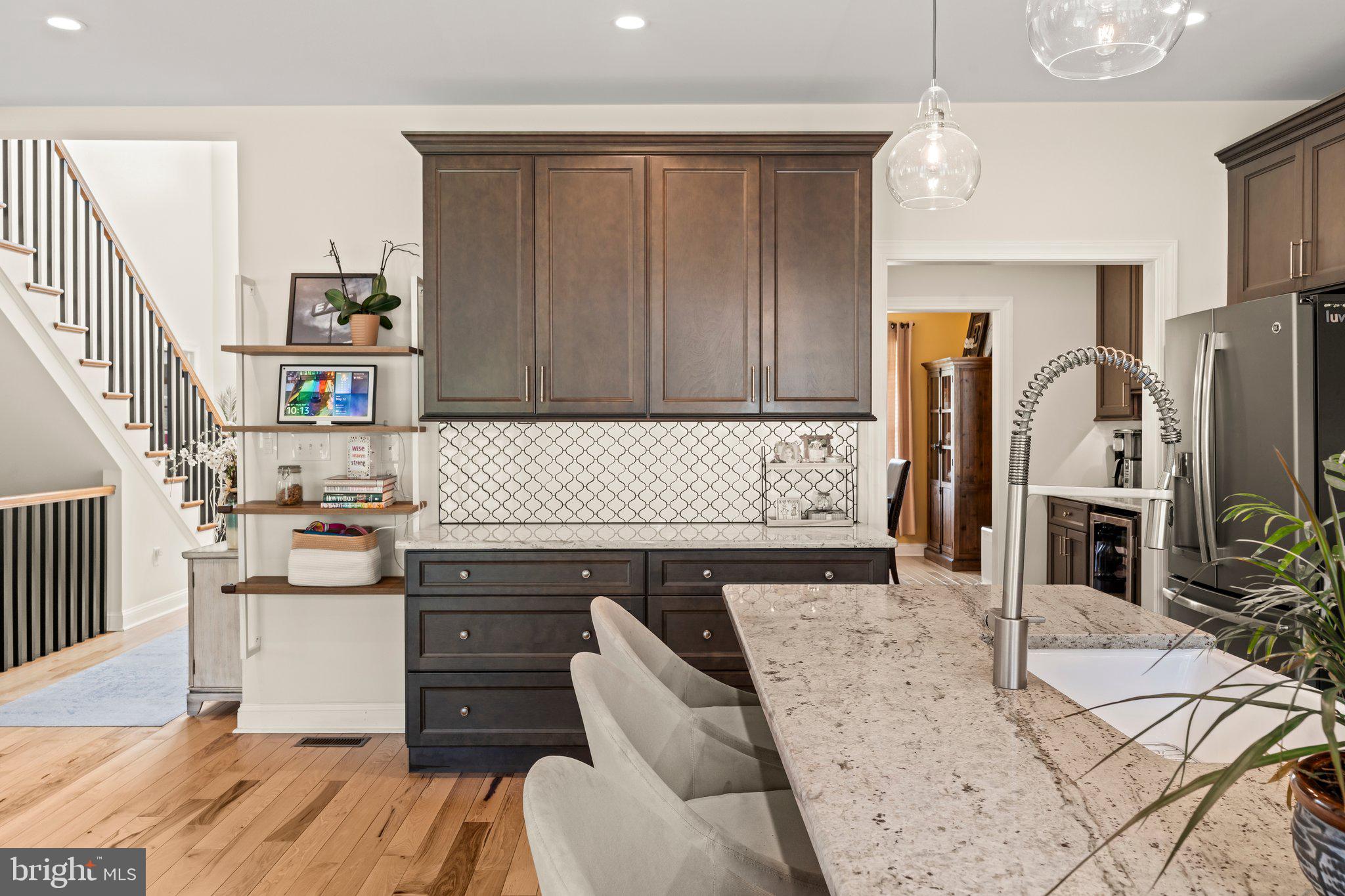 1413 Cortez Road Blue Bell, PA 19422 - Photo 20 of 66 a kitchen with granite countertop a stove and a refrigerator