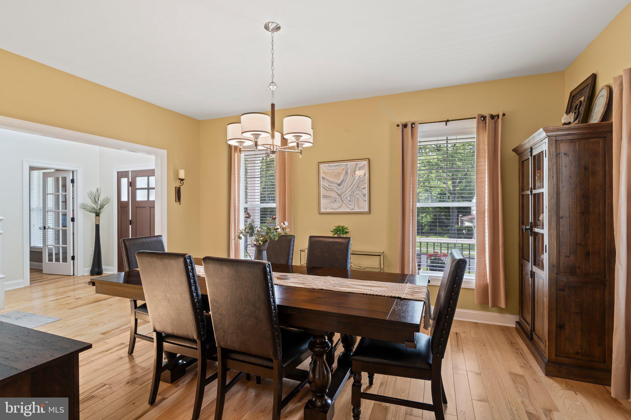 1413 Cortez Road Blue Bell, PA 19422 - Photo 21 of 66 a view of a dining room with furniture window and wooden floor