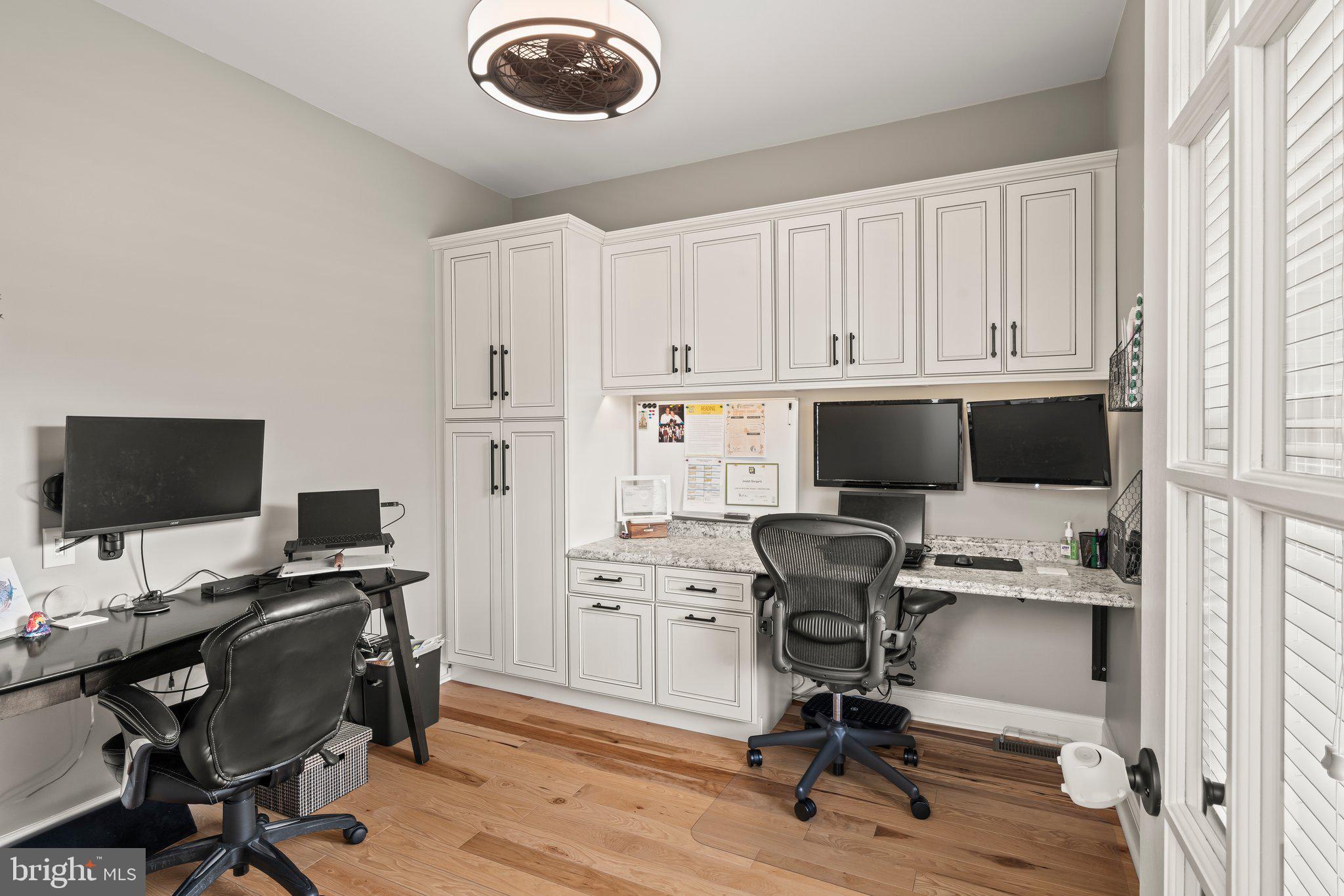 1413 Cortez Road Blue Bell, PA 19422 - Photo 23 of 66 a view of a workspace with furniture and a window