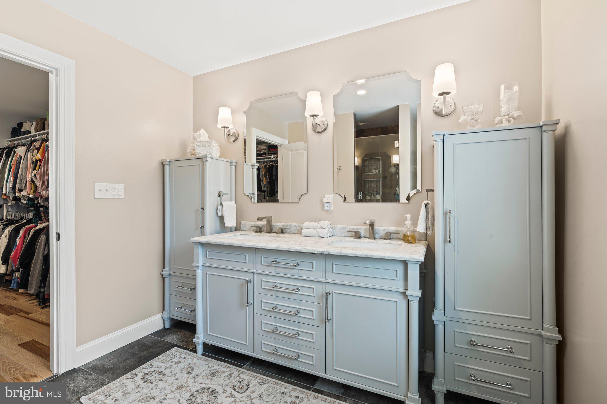 1413 Cortez Road Blue Bell, PA 19422 - Photo 30 of 66 a bathroom with a double vanity sink and a mirror