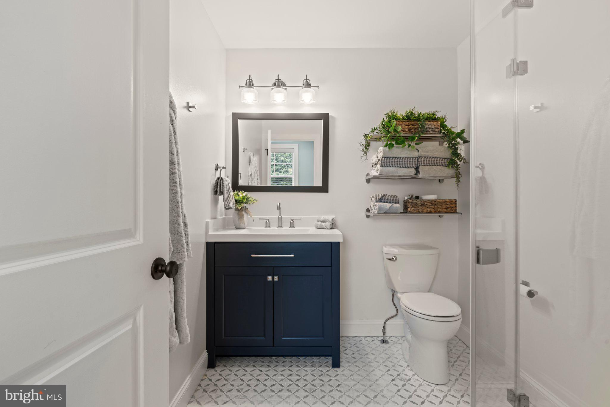 1413 Cortez Road Blue Bell, PA 19422 - Photo 37 of 66 a bathroom with a sink a toilet and shower