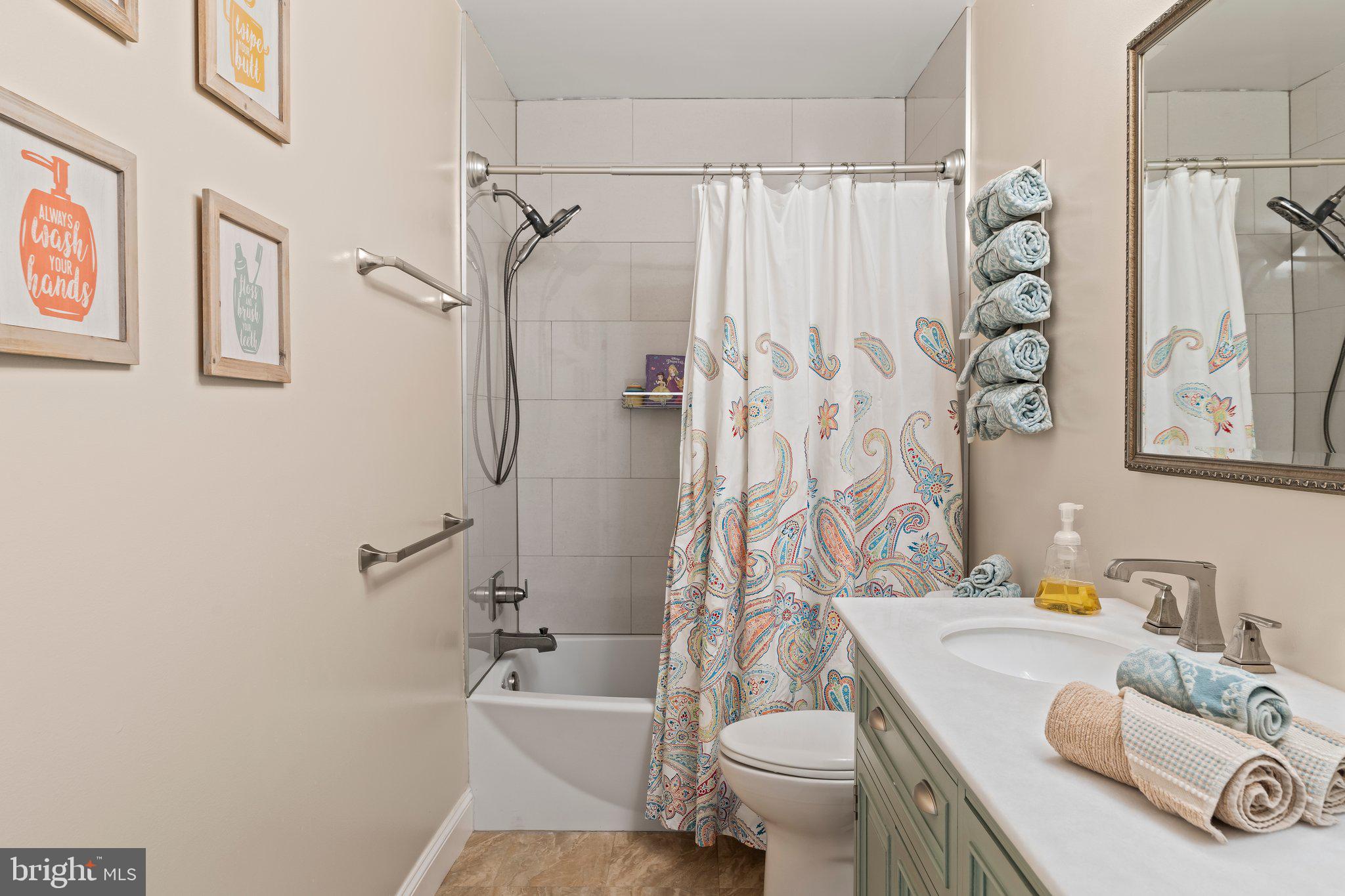 1413 Cortez Road Blue Bell, PA 19422 - Photo 41 of 66 a bathroom with a sink toilet and shower