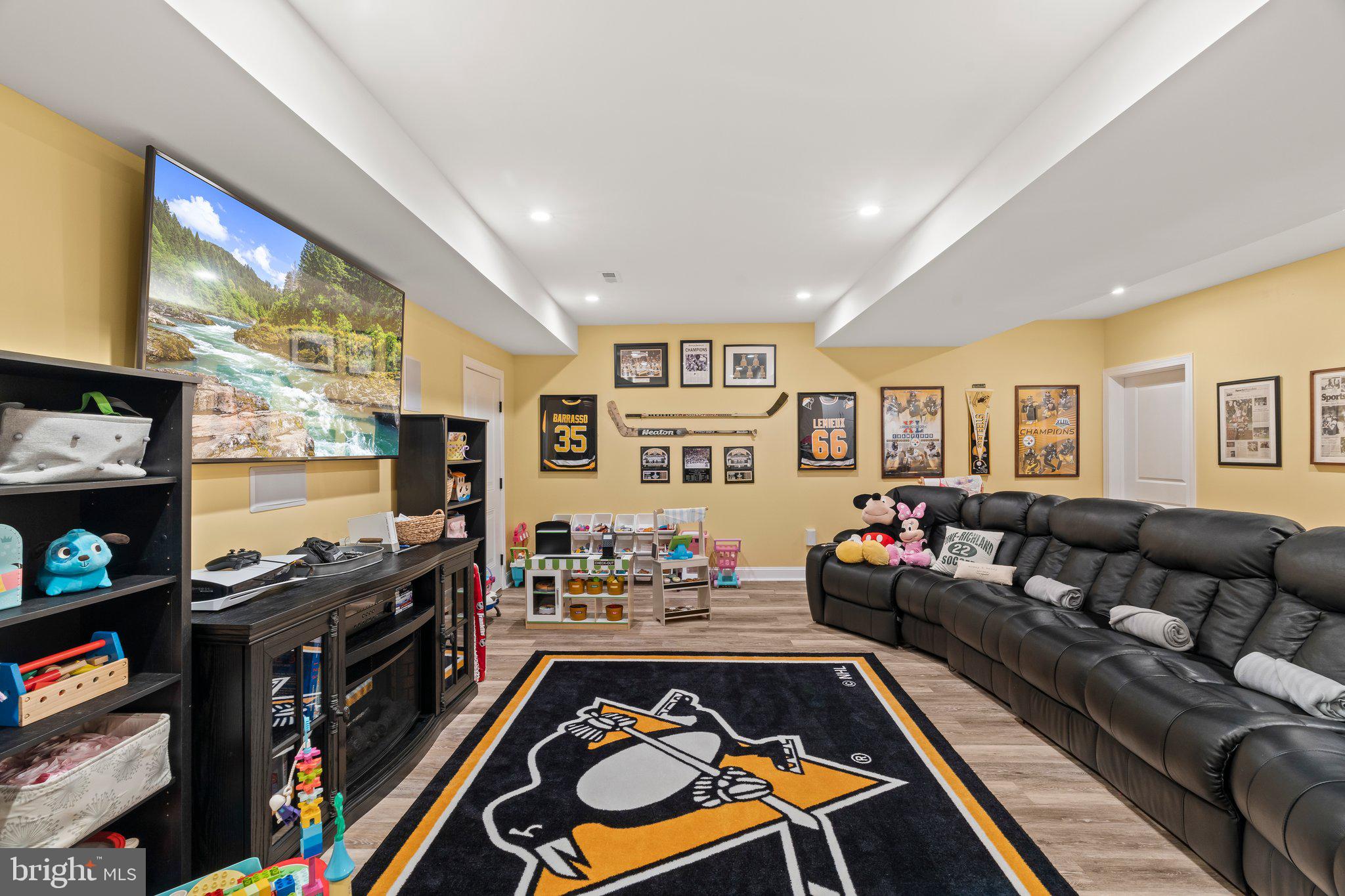1413 Cortez Road Blue Bell, PA 19422 - Photo 47 of 66 a living room with furniture and a flat screen tv