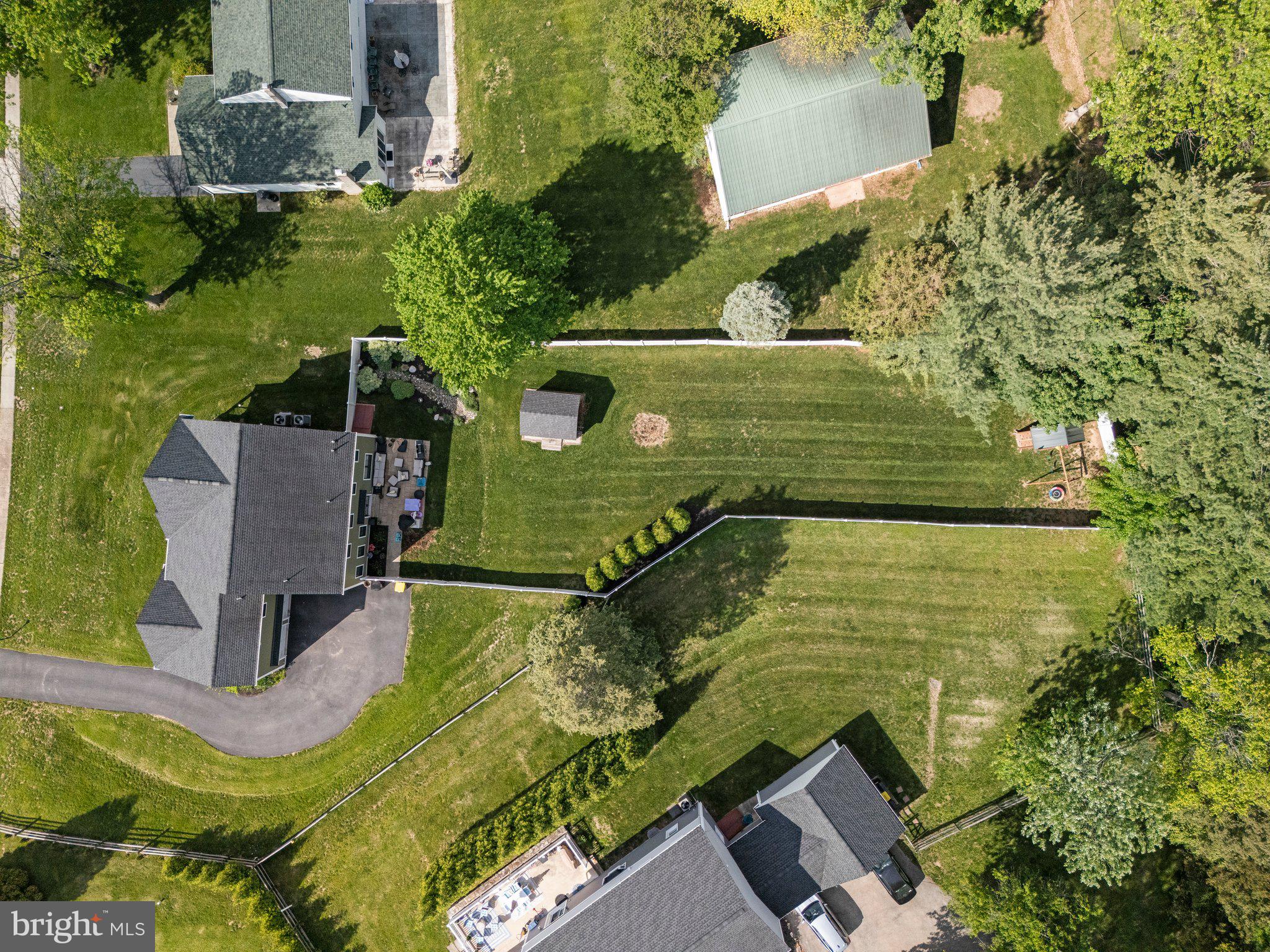 1413 Cortez Road Blue Bell, PA 19422 - Photo 52 of 66 an aerial view of a house with a yard