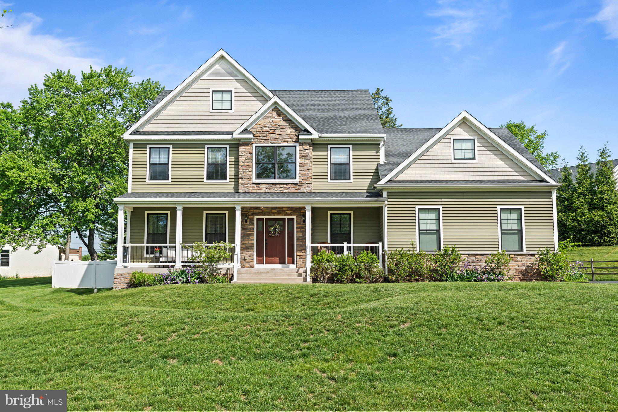 1413 Cortez Road Blue Bell, PA 19422 - Photo 63 of 66 a front view of a house with garden