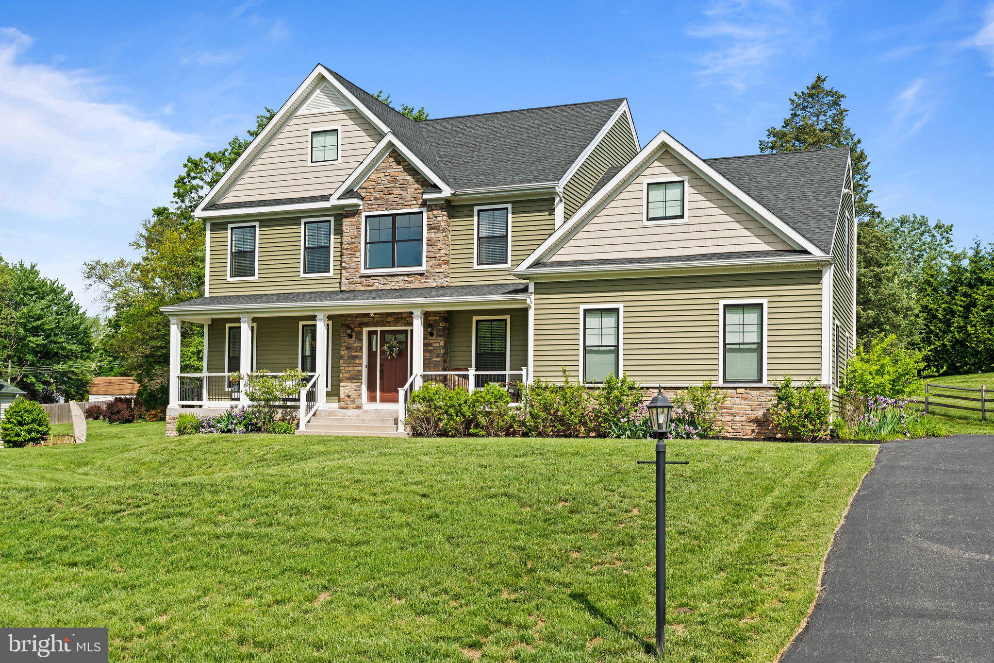 1413 Cortez Road Blue Bell, PA 19422 - Photo 64 of 66 a front view of a house with garden