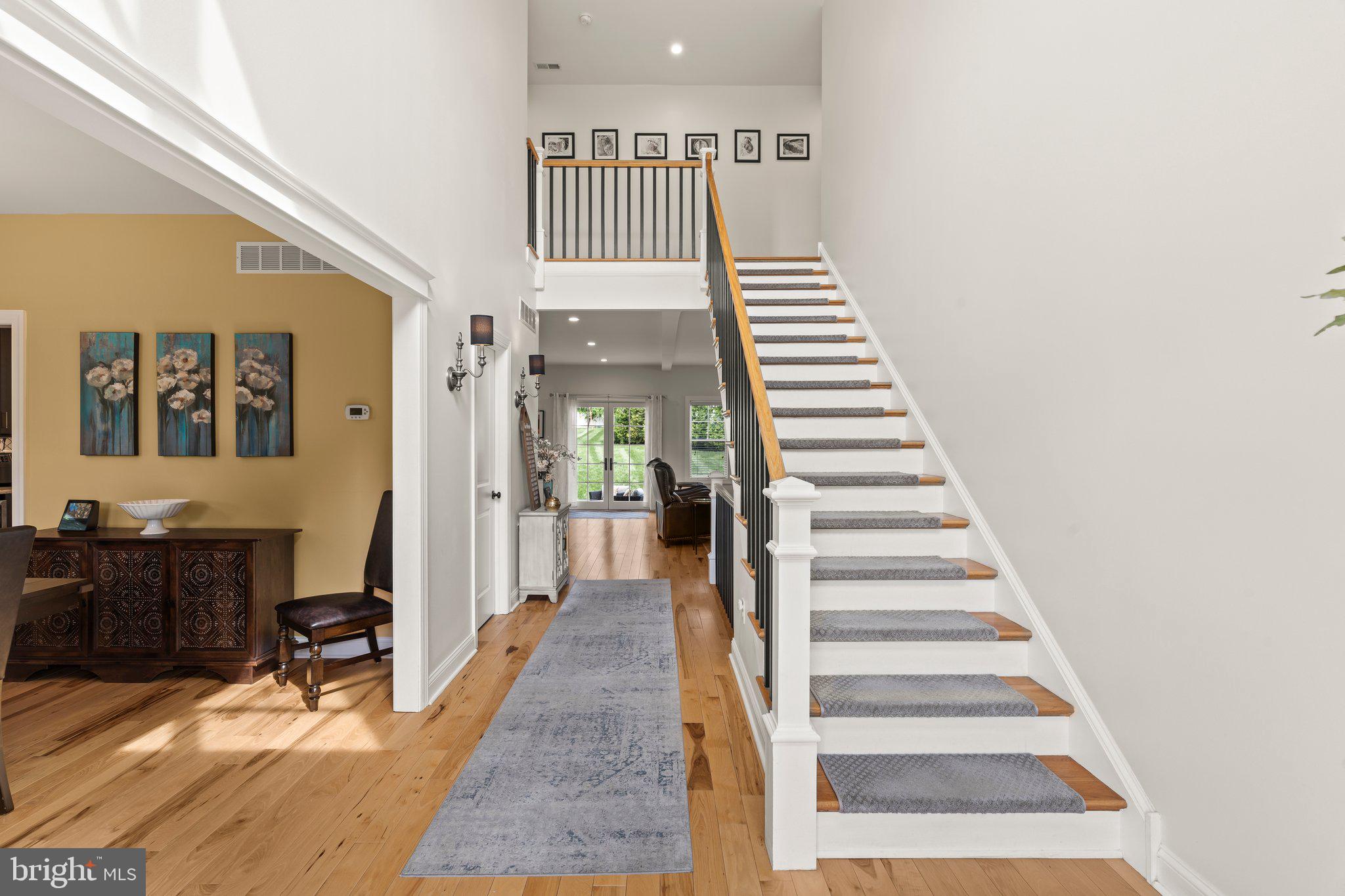 1413 Cortez Road Blue Bell, PA 19422 - Photo 8 of 66 a view of a hallway with wooden floor and entryway