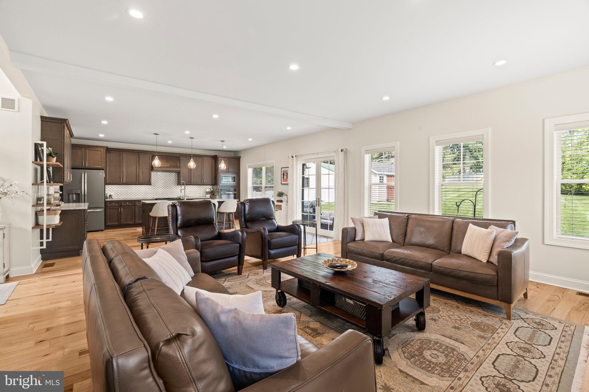 1413 Cortez Road Blue Bell, PA 19422 - Photo 10 of 66 a living room with furniture kitchen view and a large window