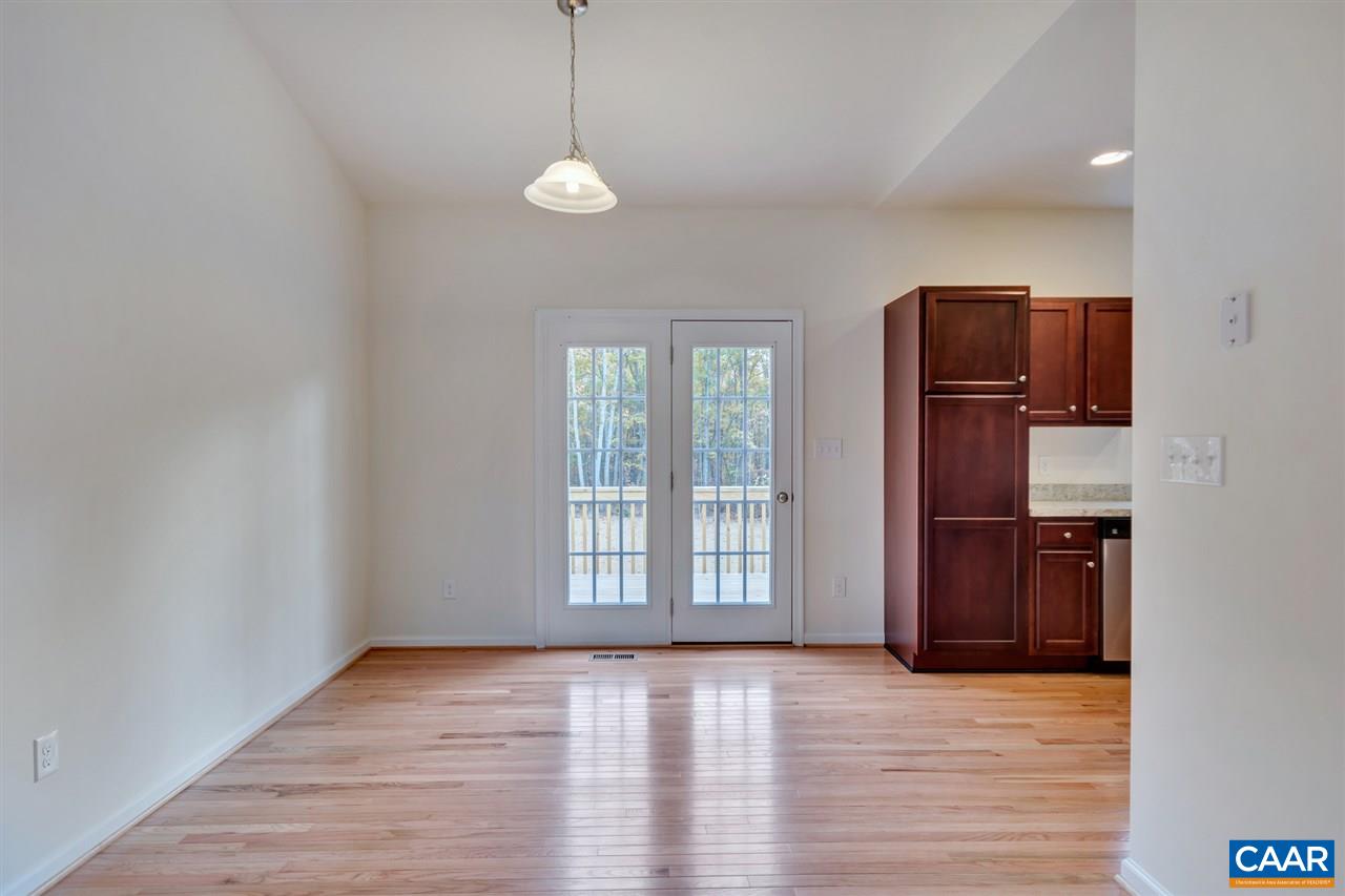 2235 Swift Run Road Ruckersville, VA 22968 - Photo 8 of 21 a view of an empty room with window and wooden floor