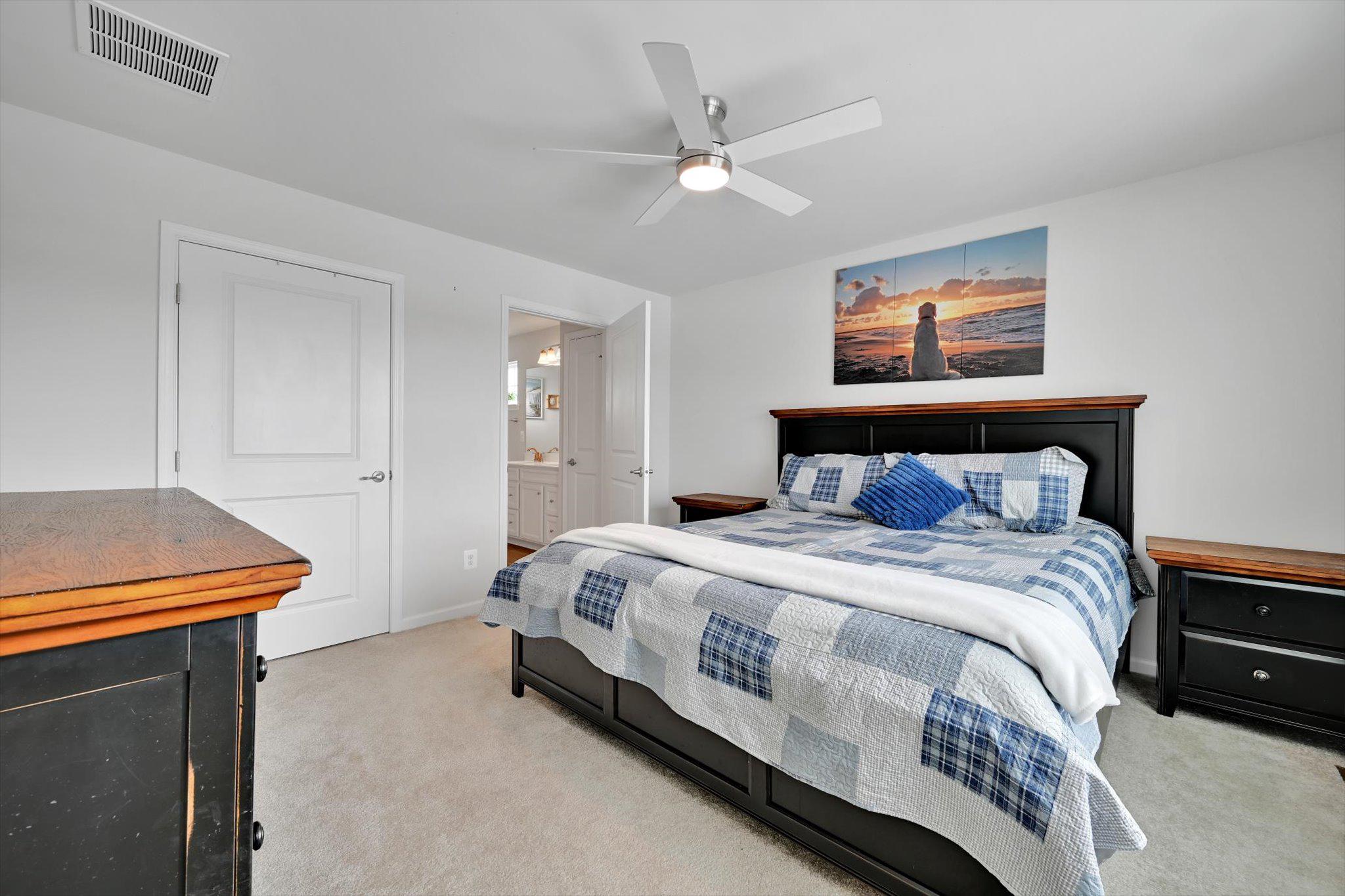415 Courtland Road Atglen, PA 19310 - Photo 10 of 26 a bedroom with a bed and a chandelier