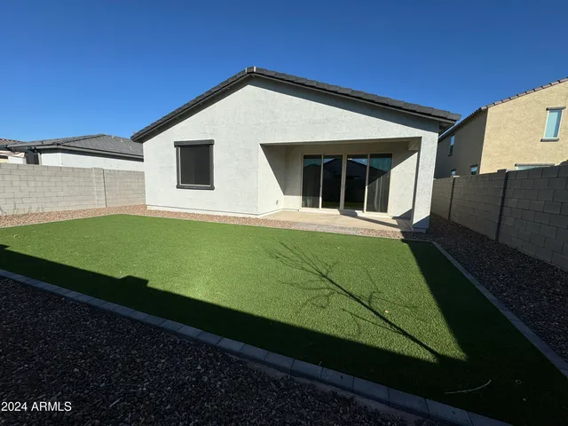 a view of a street with sitting area