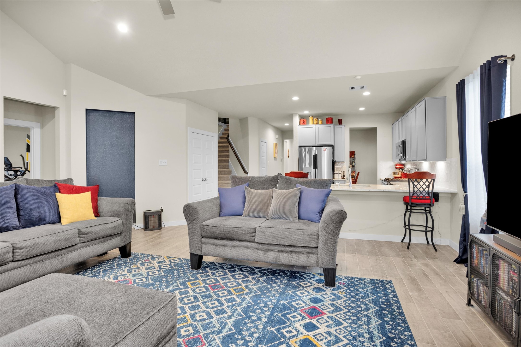 2210 Reed Cave Ln Spring Spring, TX 77386 - Photo 14 of 40 a living room with furniture and a flat screen tv