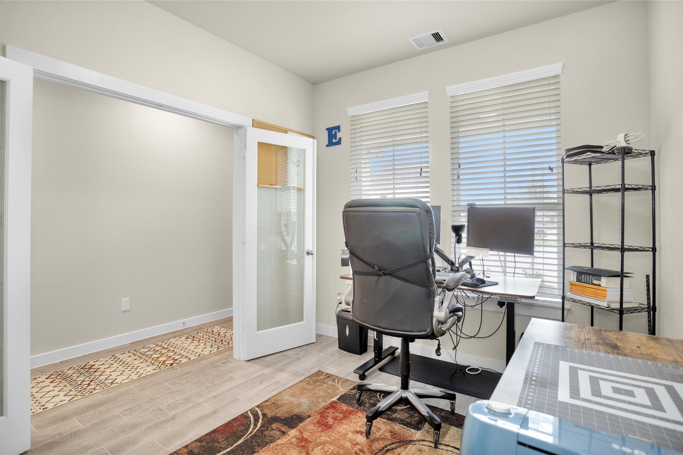 2210 Reed Cave Ln Spring Spring, TX 77386 - Photo 17 of 40 a workspace with furniture and wooden floor