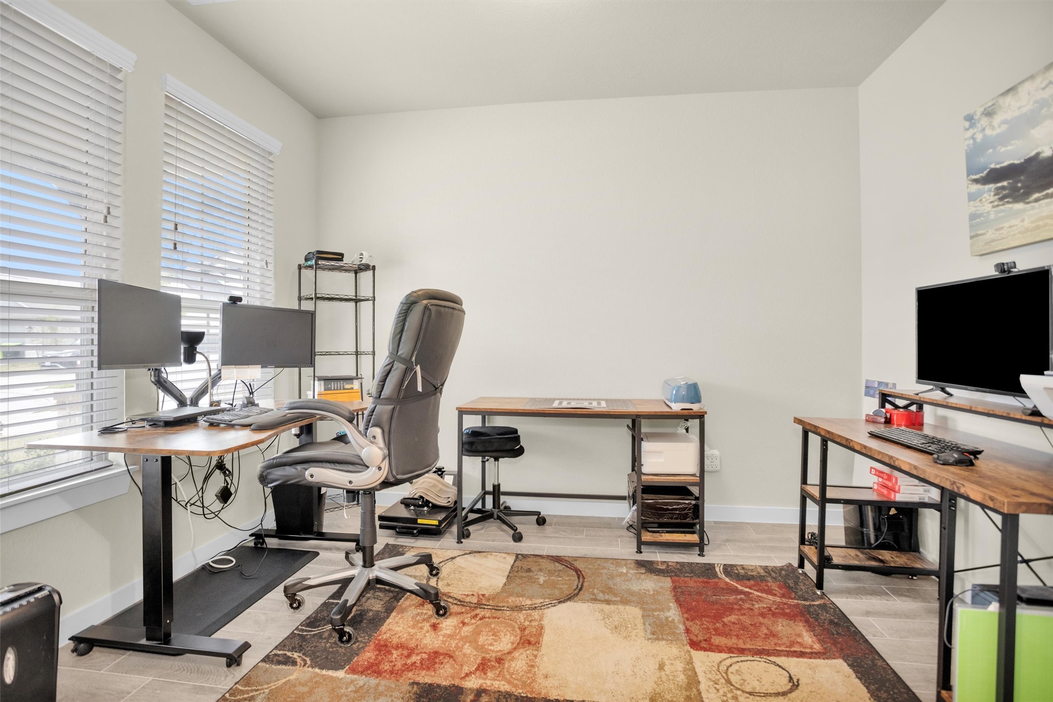 2210 Reed Cave Ln Spring Spring, TX 77386 - Photo 18 of 40 a view of a workspace with furniture and a window