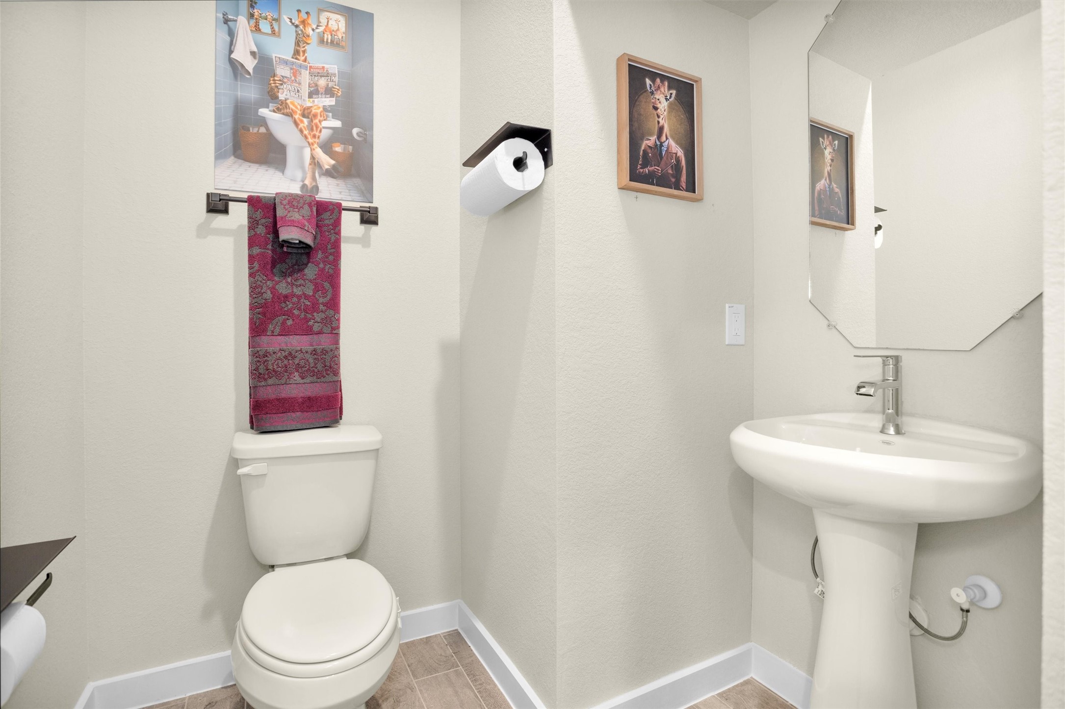 2210 Reed Cave Ln Spring Spring, TX 77386 - Photo 19 of 40 a bathroom with a toilet sink and mirror