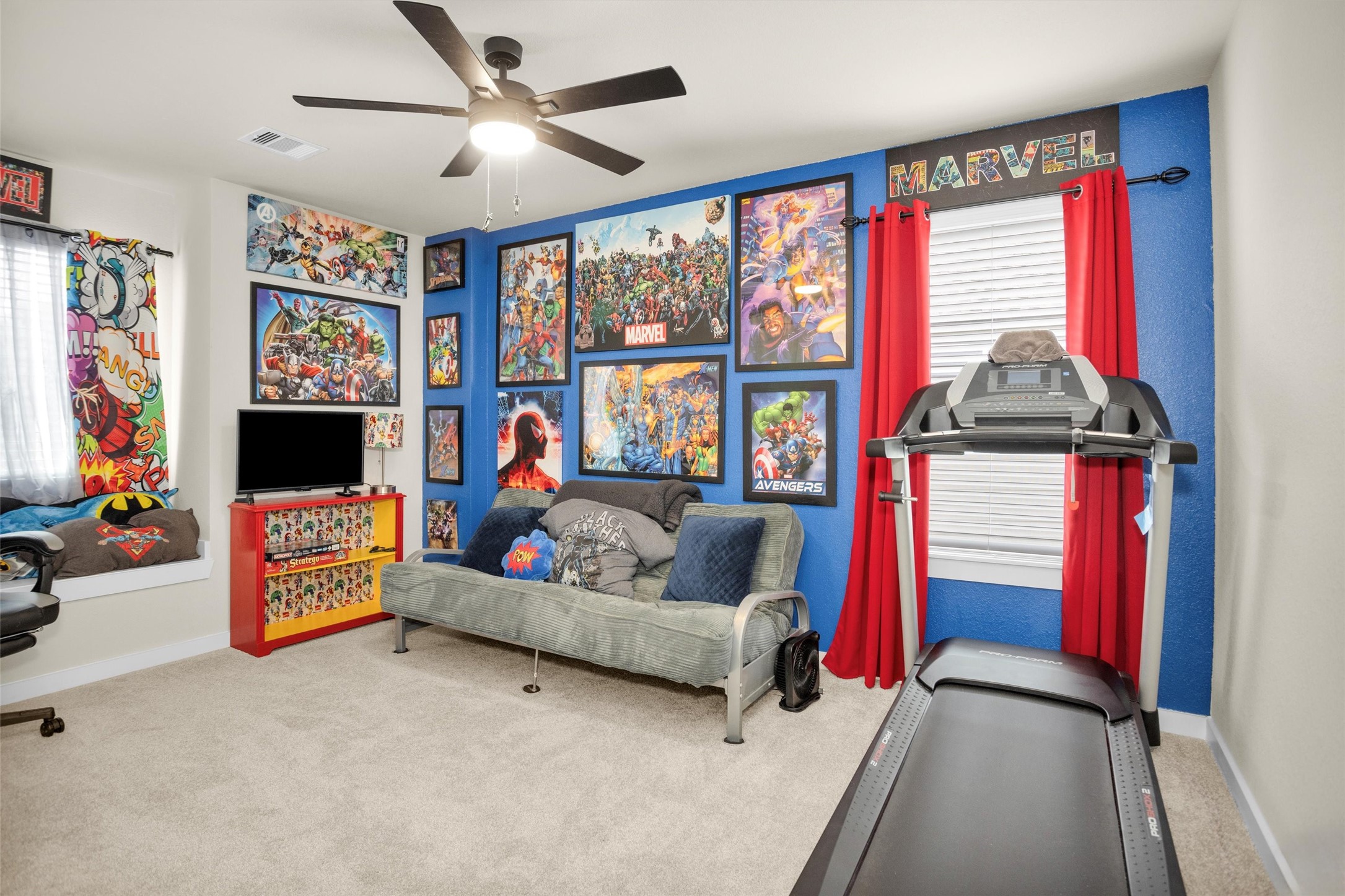 2210 Reed Cave Ln Spring Spring, TX 77386 - Photo 33 of 40 a living room with furniture and a flat screen tv