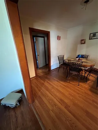 a workspace with furniture and wooden floor