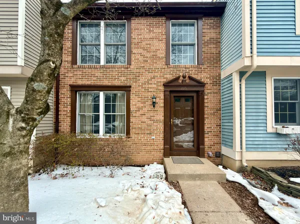 a front view of a brick house