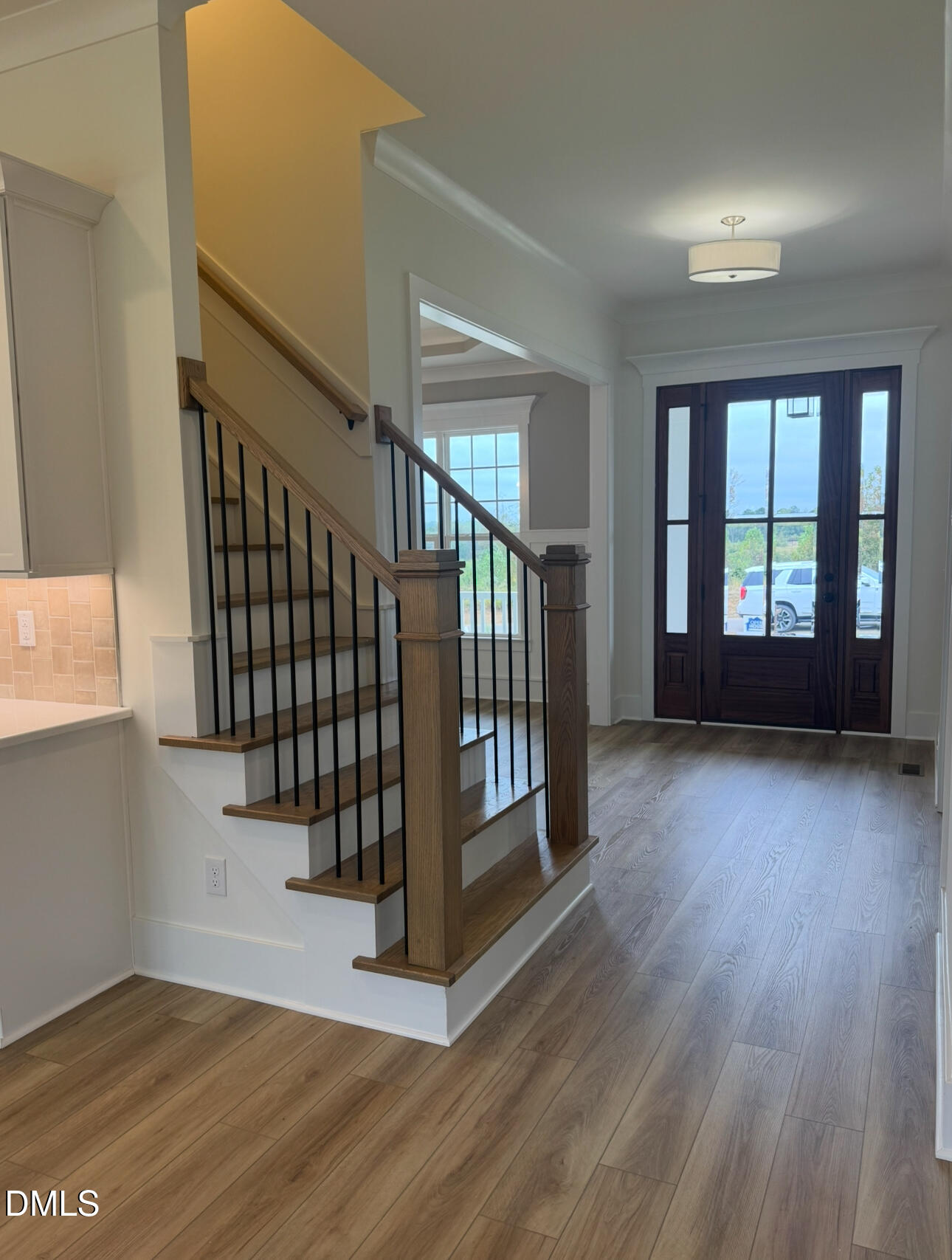 1037 Azalea Garden Circle Raleigh, NC 27603 - Photo 13 of 24 a view of an entryway with wooden floor