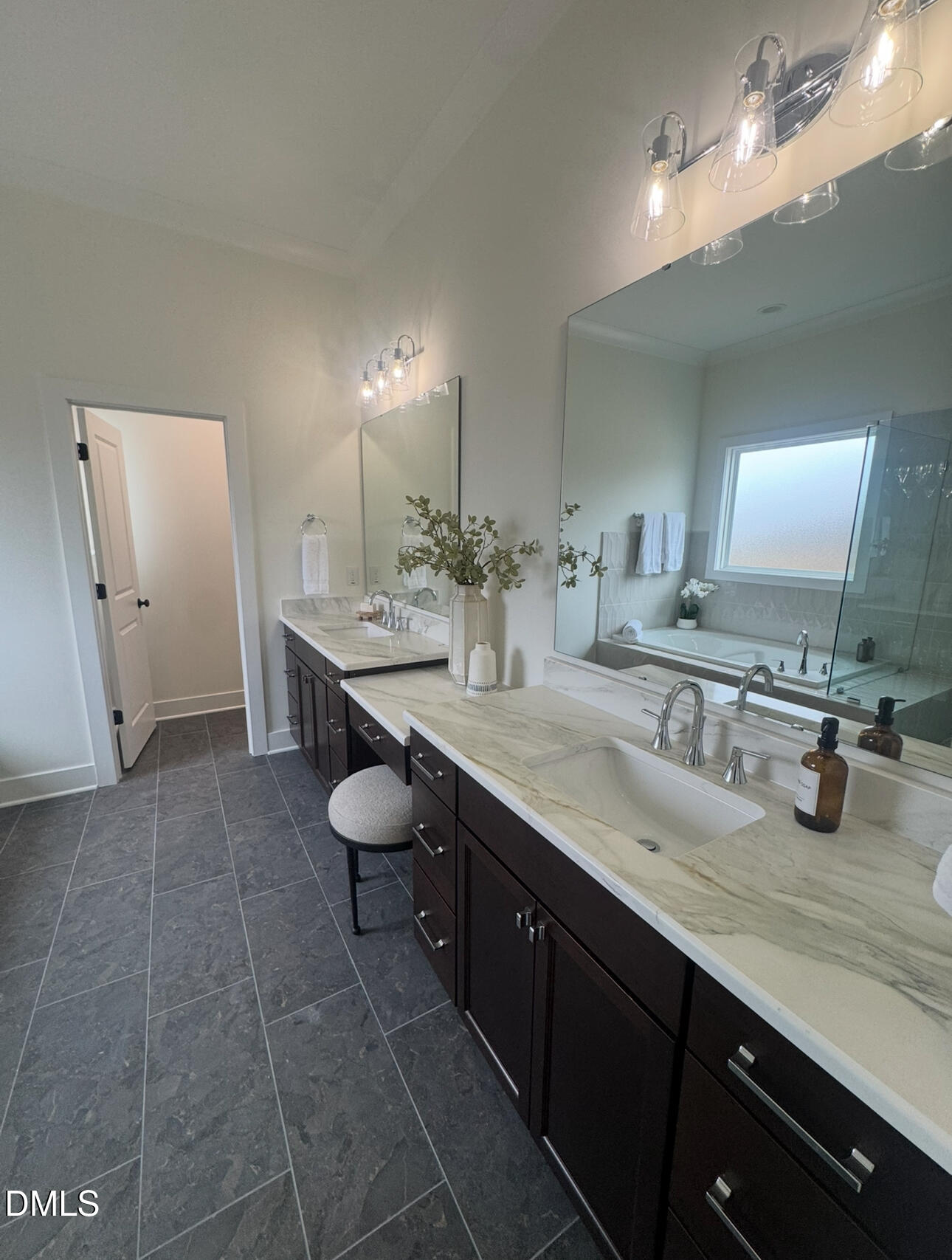 1037 Azalea Garden Circle Raleigh, NC 27603 - Photo 17 of 24 a bathroom with a granite countertop sink a toilet and a mirror