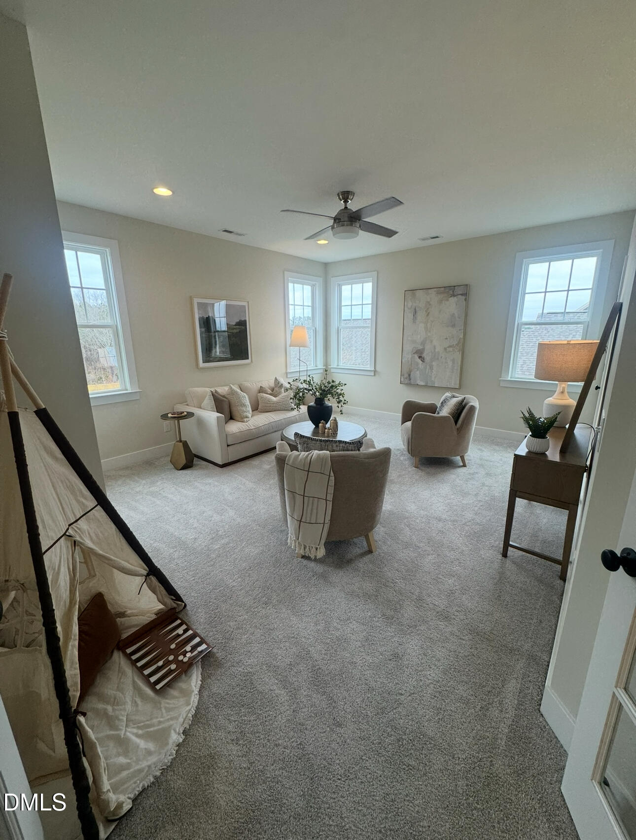 1037 Azalea Garden Circle Raleigh, NC 27603 - Photo 21 of 24 a living room with furniture and a flat screen tv