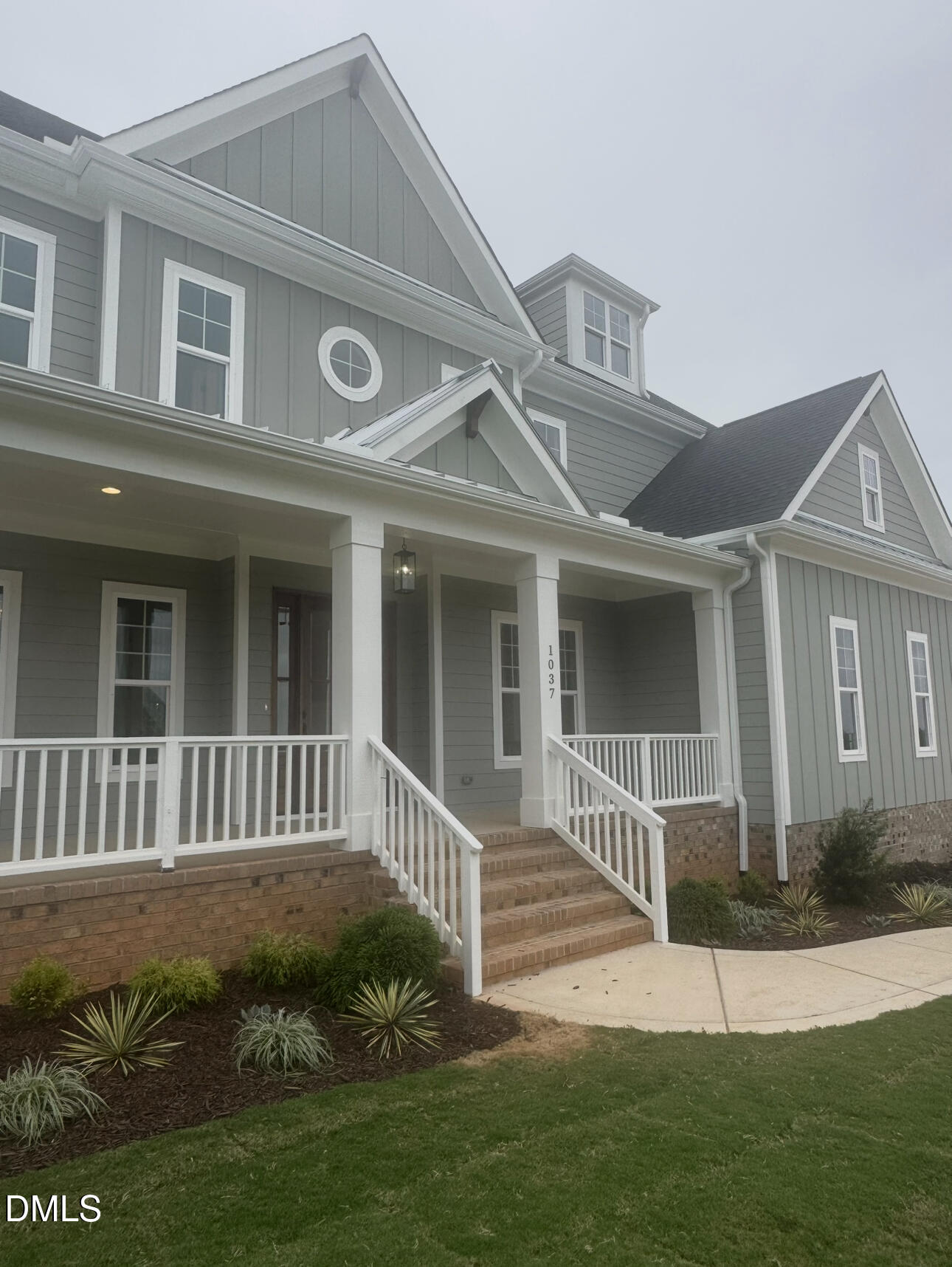 1037 Azalea Garden Circle Raleigh, NC 27603 - Photo 3 of 24 a front view of a house with a yard