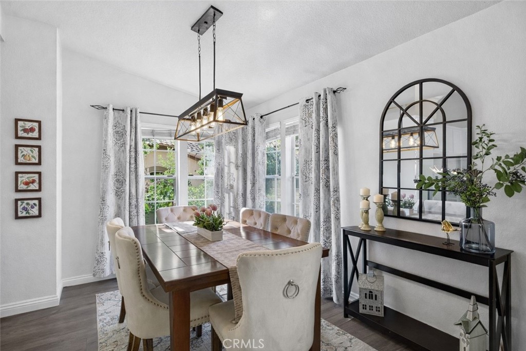 98 Pasto Rico Rancho Santa Margarita, CA 92688 - Photo 11 of 47 This photo has been AI enhanced to show what the room would look like with white walls.