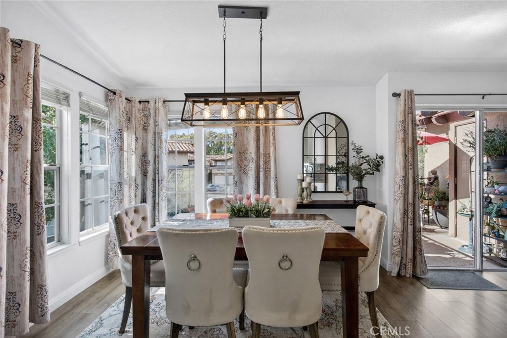 98 Pasto Rico Rancho Santa Margarita, CA 92688 - Photo 13 of 47 This photo has been AI enhanced to show what the room would look like with white walls.