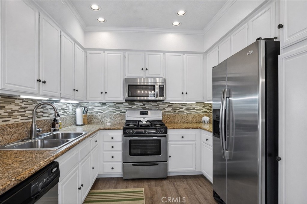 98 Pasto Rico Rancho Santa Margarita, CA 92688 - Photo 17 of 47 This photo has been AI enhanced to show what the room would look like with white walls.