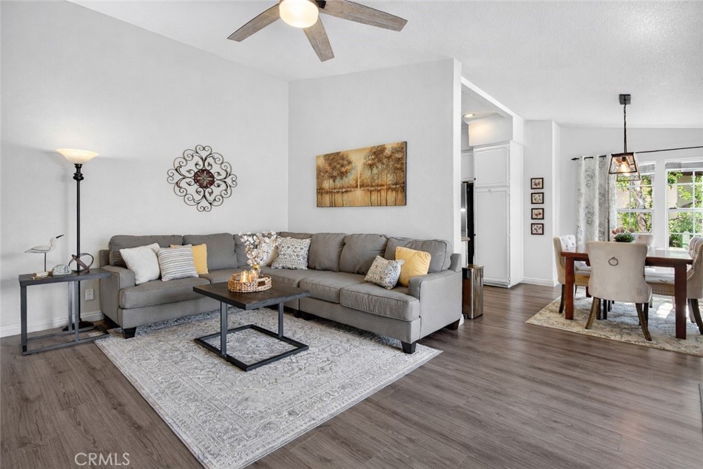 98 Pasto Rico Rancho Santa Margarita, CA 92688 - Photo 7 of 47 This photo has been AI enhanced to show what the room would look like with white walls.