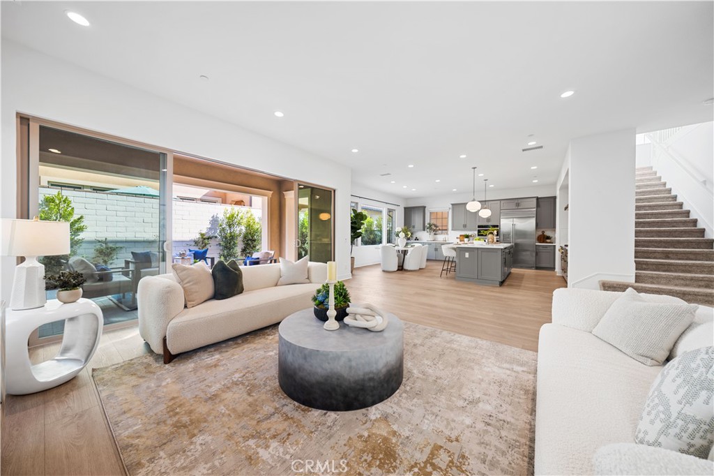 210 Sutters Mill Irvine, CA 92602 - Photo 16 of 46 a living room with furniture and a large window